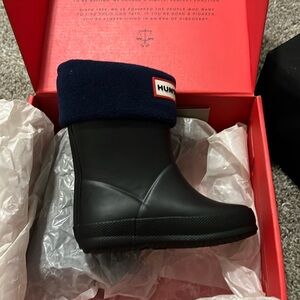 Hunter black boots with navy blue socks size 5c